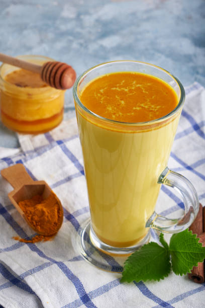 istock Turmeric milk. Cooked golden milk in a glass 1219013896