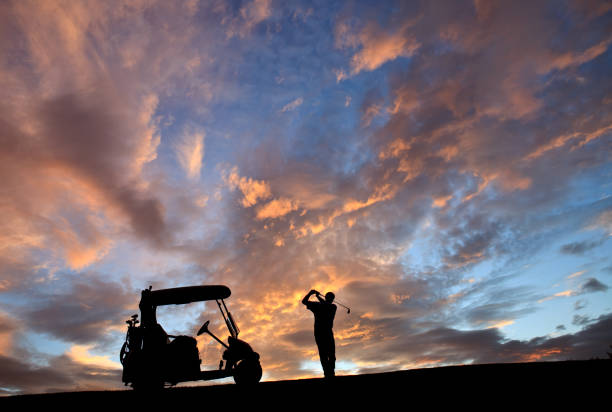 istock Silhouette of Golfer at Sunset 1219014303