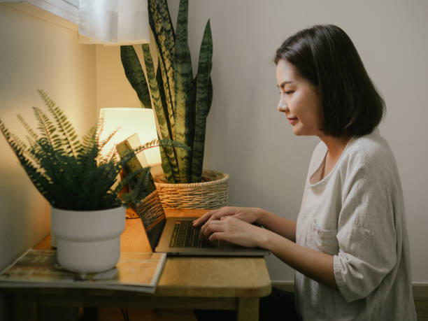 istock Young woman freelancer working home 1219019356