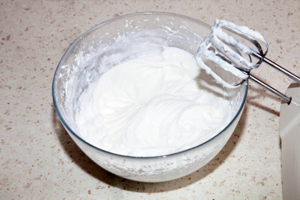 istock making whipped cream with a mixer in the kitchen 1219022134