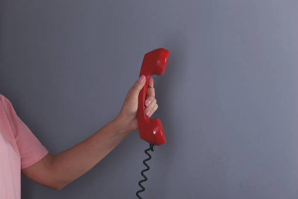 istock woman hand vintage phone 1219023894