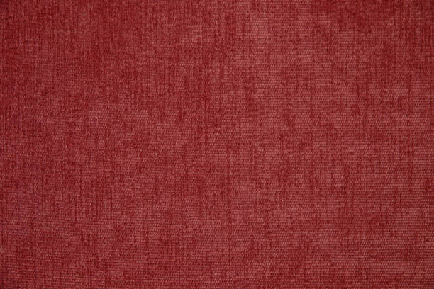 istock dark red velveteen texture background. 1219024322