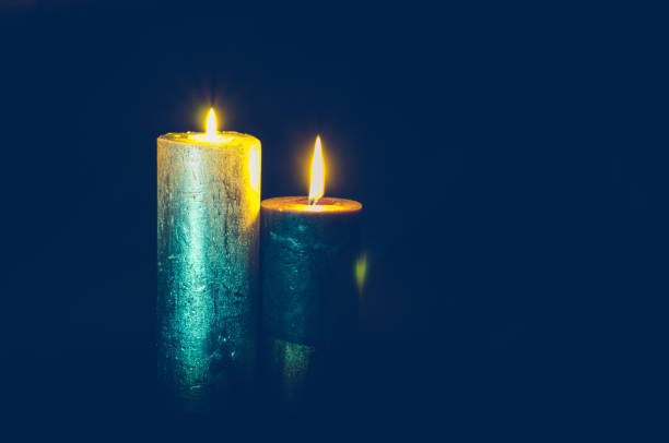 istock sadness in two symbolic burning candles 1219024898