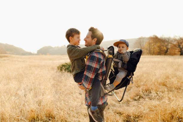 istock Dad and his boys hiking together 1219025296