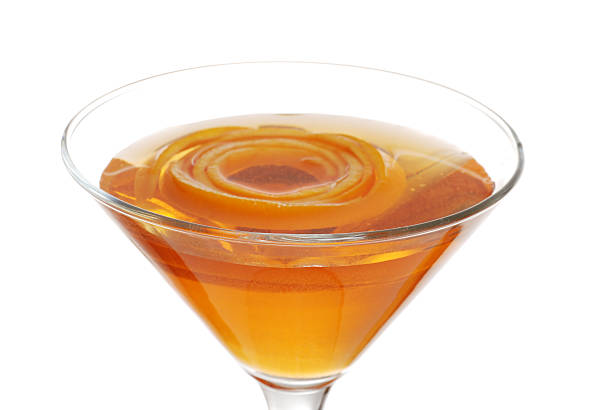 istock sparkling orange martini with peel floating focus on rim 121902596