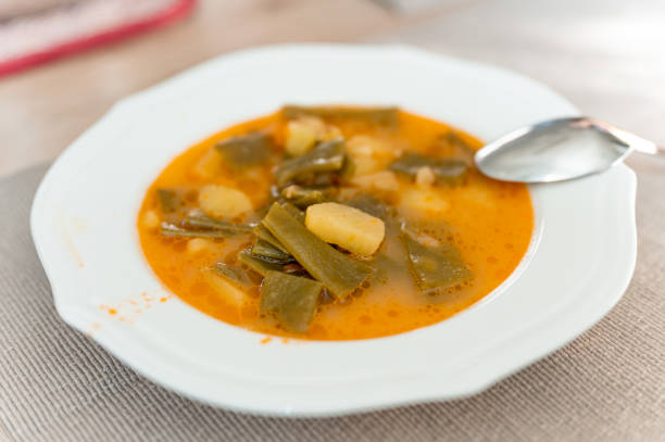 istock Close up of a vegetable soup in a white plate 1219031265