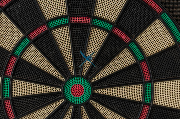 istock Red and blue dart arrrow hitting in the target.Darts sport concept. 1219032390