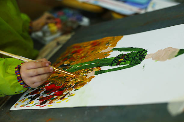 istock a lesson in an art school for children on paint, modeling and application, future artists create masterpieces 1219033419