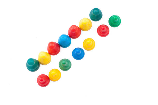 istock Colorful play figures with dice isolated on white background.Copy space. 1219035116