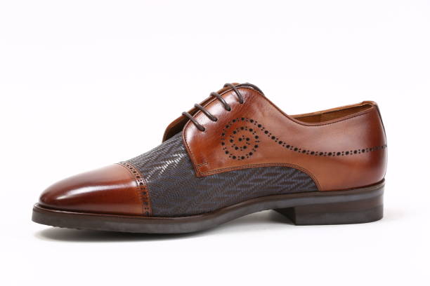 istock Leather new shiny business shoes isolated on white 1219037897