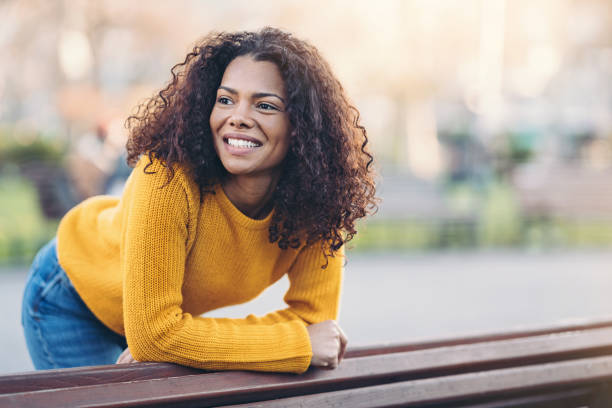 istock Smiling girl outdoors in the park 1219037945