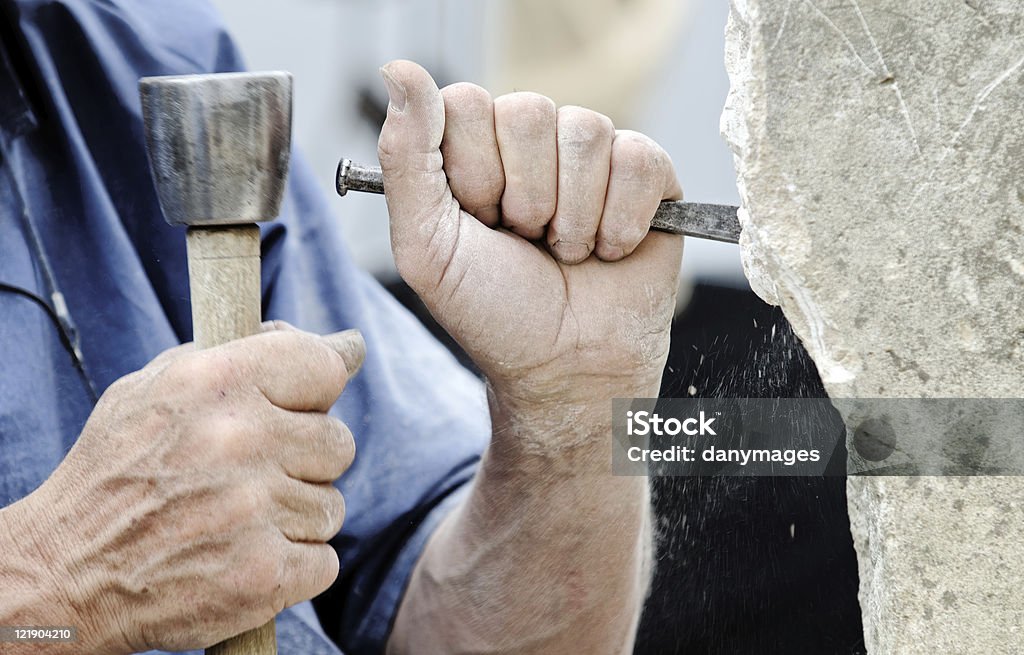stone sculptor a stone carver at work Sculptor Stock Photo