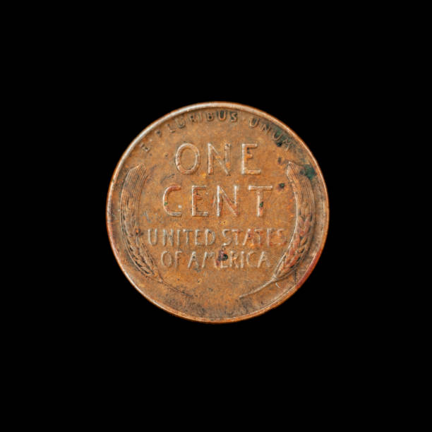 istock An old American penny on a black background 1219042862