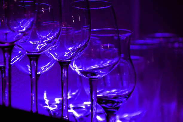 istock 11 Wine glasses and glasses on a shelf in a bar 1219043044