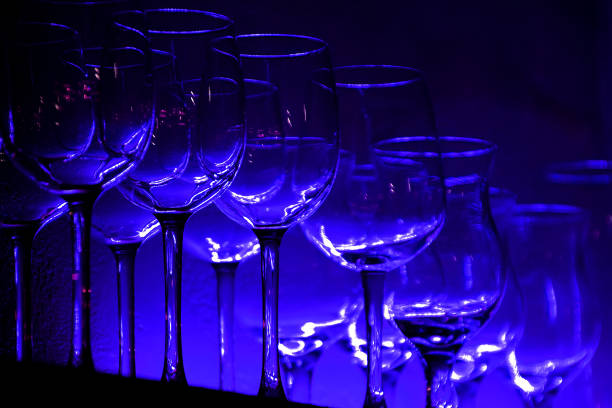 istock 9 Wine glasses and glasses on a shelf in a bar 1219043088