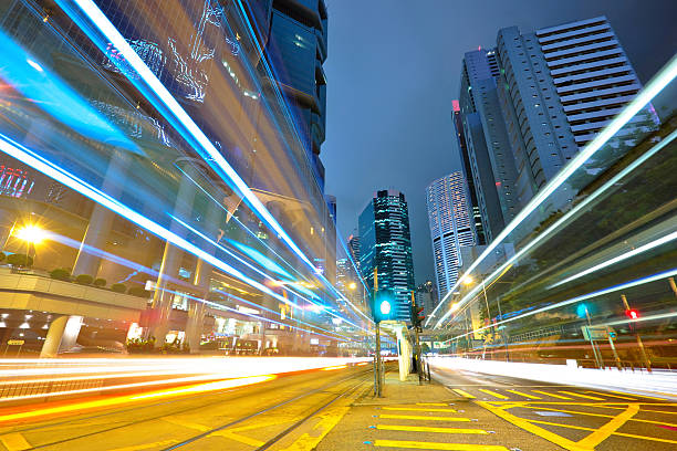 istock traffic light stream and highrise bulidings 121904316