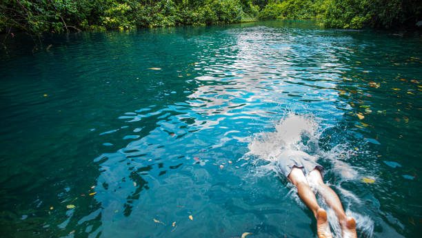 istock A man diving into the Blu Lagoon in Vanuatu 1219045051