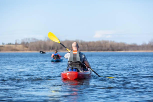 istock Father & Daughter Kayaking on Lake in Early Springtime 1219047046