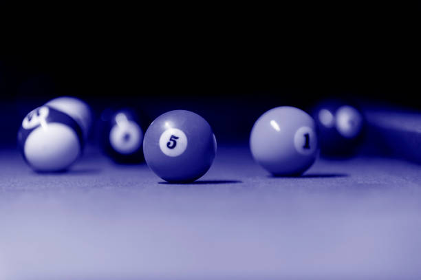 istock Billiard balls in a blue pool table. Phantom color trend 2020. Banner Art concept 1219049098