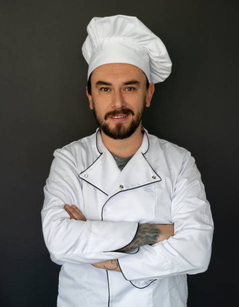 istock Portrait of a happy chef smiling 1219051816