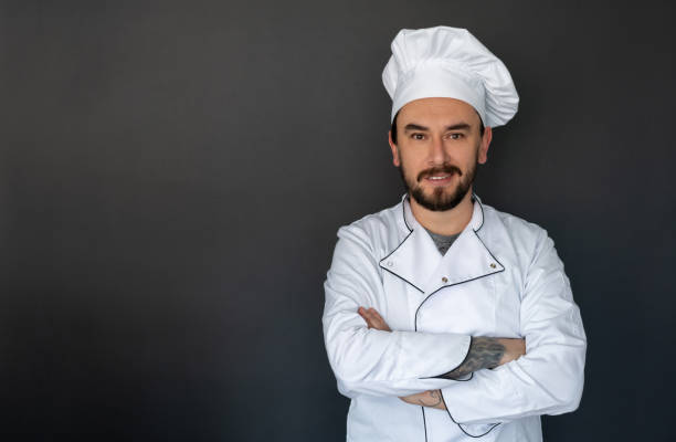 istock Portrait of a happy chef smiling 1219051822