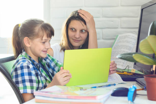 istock Mom is shocked by how her daughter is well versed in modern Internet technologies 1219057549