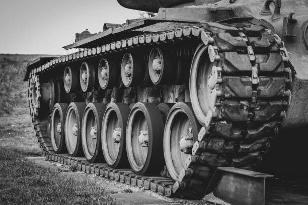 Tank tracks Caterpillar of a World War II tank in Belgium on the German border. armored tank photos stock pictures, royalty-free photos & images