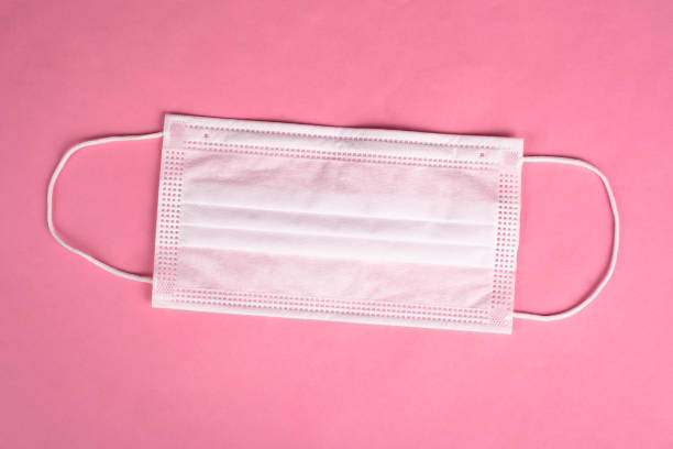 istock medical gauze protective mask on a pink background 1219063015