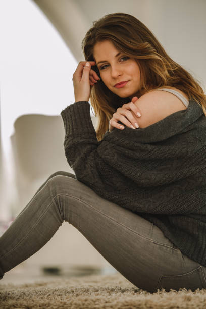 istock Confident young woman looking at camera and smiling 1219063670