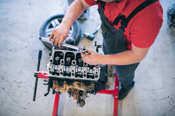 istock Aerial View Of Mechanic Repair Engine 1219063901