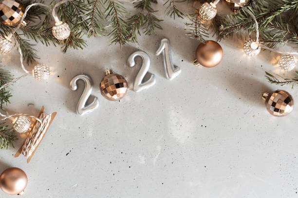 istock New Year 2021 silver balloons with fireworks 1219064123