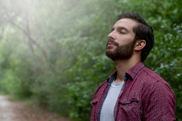 istock Young man breathing fresh air 1219079951