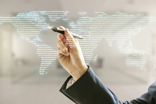 istock Multi exposure of man hand with pen working with abstract creative digital world map hologram on blurred office background, tourism and traveling concept 1219087454