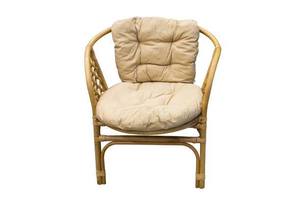 Wicker chair with padded seat isolated on white