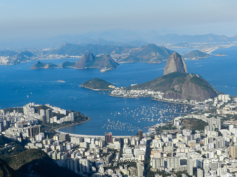 Rio de Janeiro, RJ, Brazil - September 01, 2012:  View of Sugar Loaf from Corcovado Hill, with Marina da Gloria in the center and Niteroi in the background.
