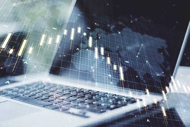 istock Multi exposure of abstract creative financial chart with world map on laptop background, research and analytics concept 1219088433
