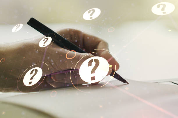istock Double exposure of question mark hologram and man hand writing in notebook on background. Sociology and psychology concept 1219089255