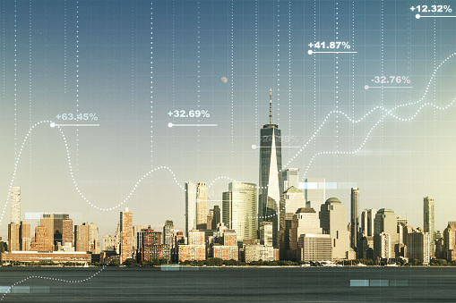 Multi exposure of creative statistics data hologram on New York city skyscrapers background, stats and analytics concept