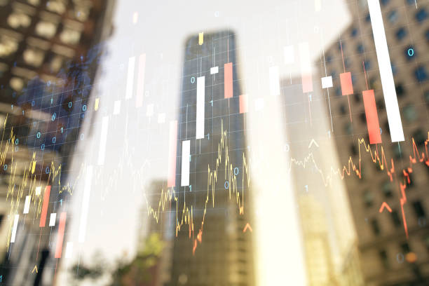 istock Double exposure of abstract financial graph with world map on office buildings background, forex and investment concept 1219089397
