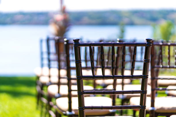 Rows of chairs for guests at an open-air wedding ceremony