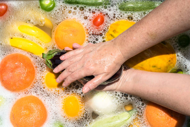 istock Fruit and vegetables washing for coronavirus disinfection. 1219094160