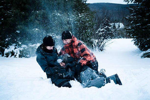 istock Family playing in the snow. 121909745