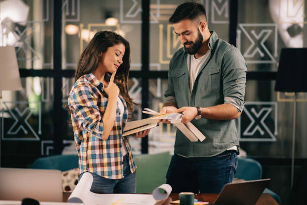 istock Colleagues working together in office. 1219098215