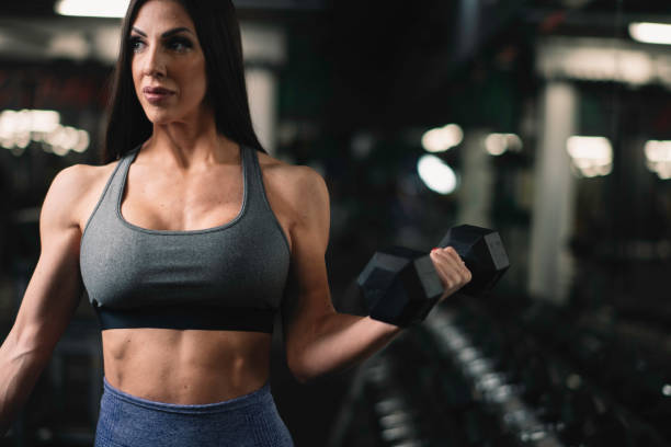 istock Beautiful young woman on training. 1219099426