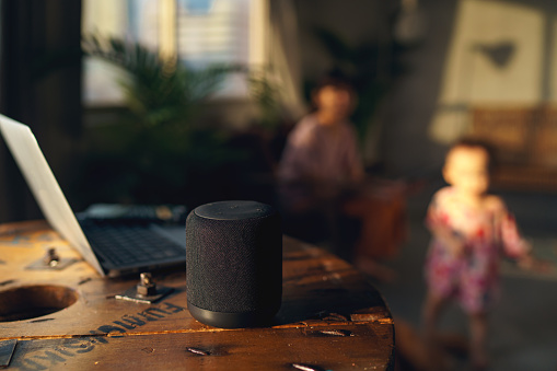 Smart speaker at home allows the parent to be more hands free while caring and supervising the active child