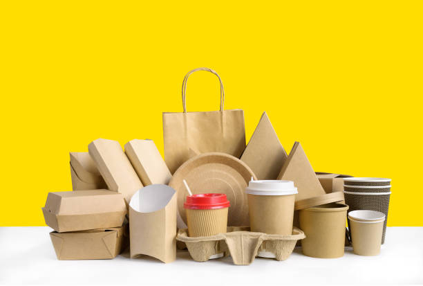 istock Fast food packaging set on yellow background. 1219103135