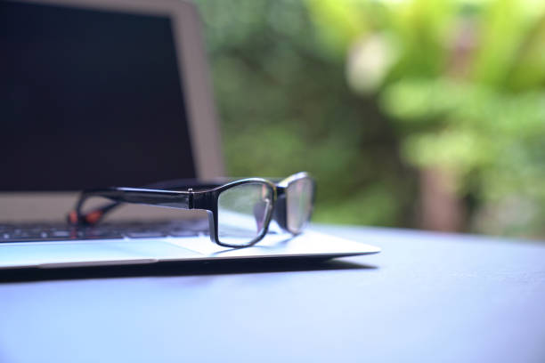 istock Spectacles on top of computer laptop. 1219108865