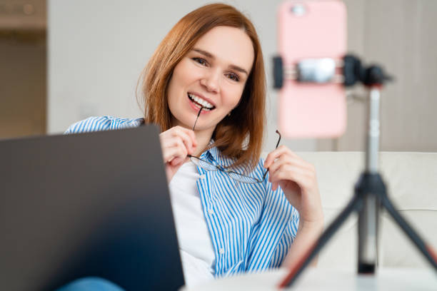 istock woman conducts live communicate online phone 1219108924