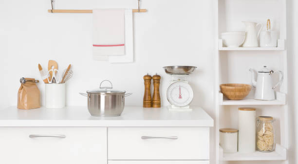 Cooking concept, kitchen counter with various kitchenware and food ingredients
