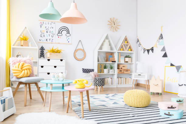 istock Spacious pastel kid's playroom interior 1219115458